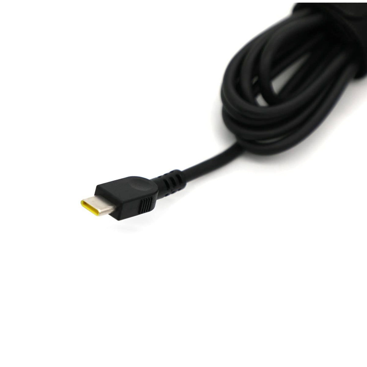 USB-C plug cable end for black laptop charger, with yellow-tipped connector