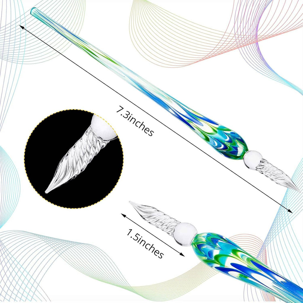 Three glass dip pens with silver nibs, blue-green and yellow swirled barrels, measuring diagram