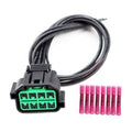 8-way headlight wiring connector with black plug, bundled wires and green terminal ports