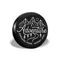 Black RV tire cover with Adventure mountain logo, round design