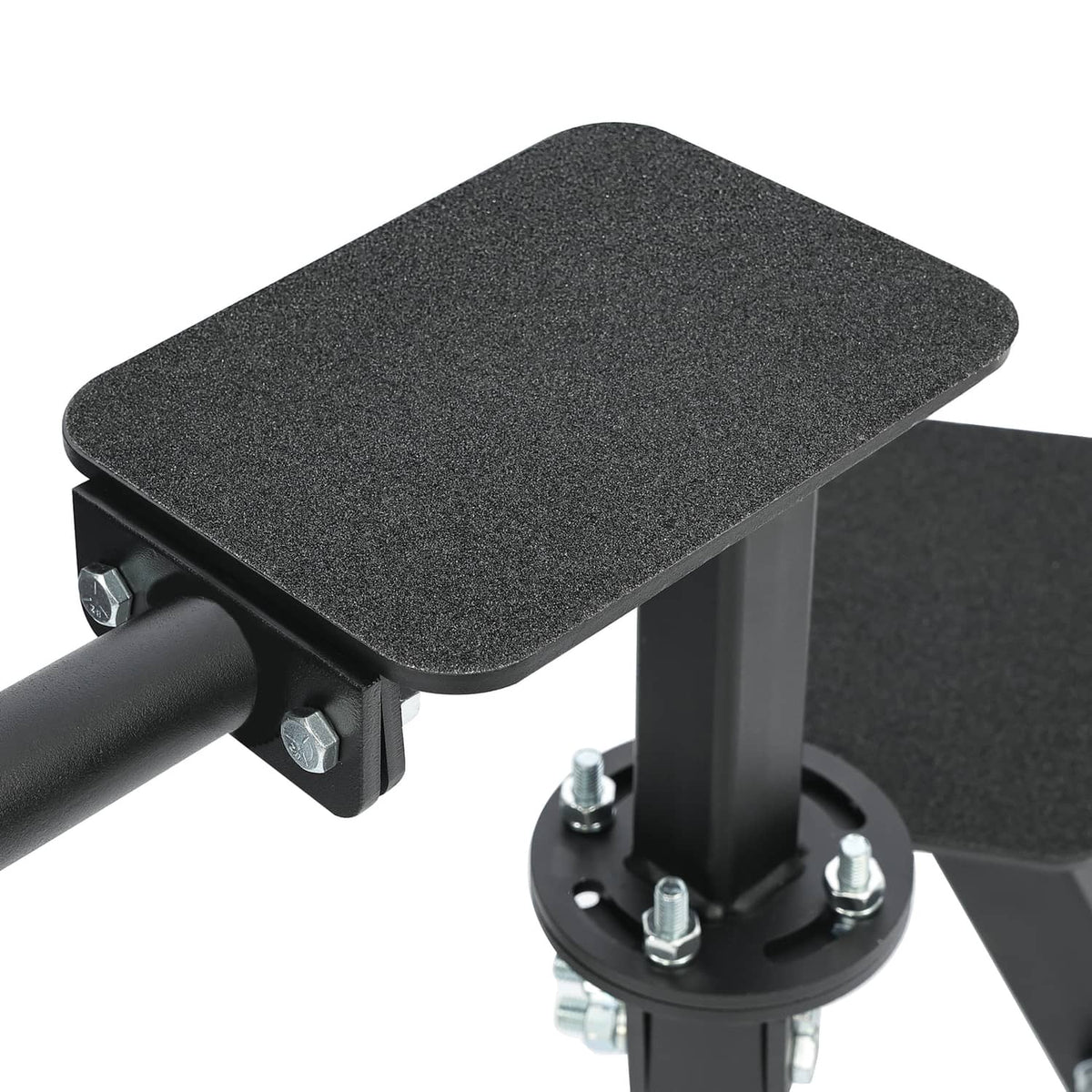 Textured anti-slip step pads with mounting bolts on boat trailer steps