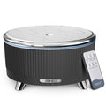 Black ultrasonic essential oil diffuser with marble-look top and light mist-ready lid