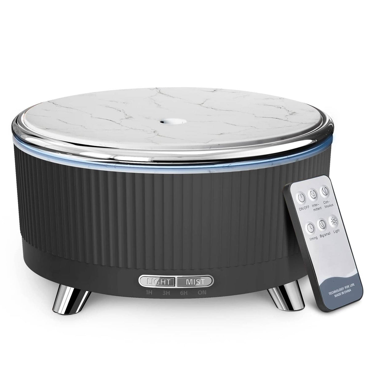 Black ultrasonic essential oil diffuser with marble-look top and light mist-ready lid