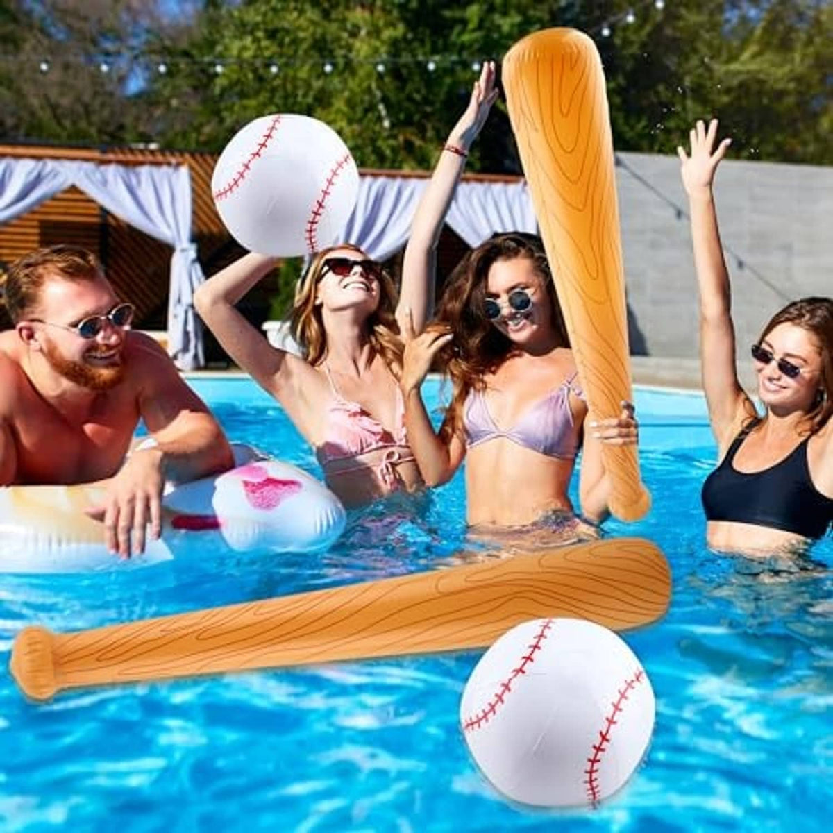 Orange inflatable baseball bats with matching white baseballs and red stitched seams