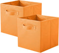 Foldable orange fabric storage cube with front handle, open top and stitched edges