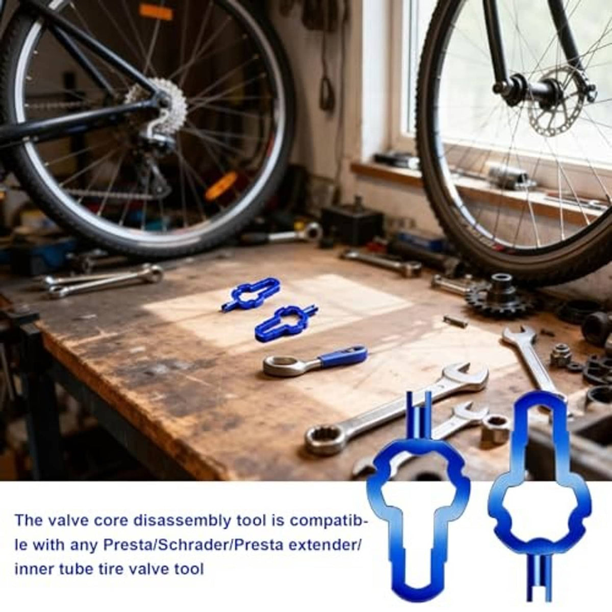 Blue Presta valve core removal tools on a repair bench, including small wrench piece.