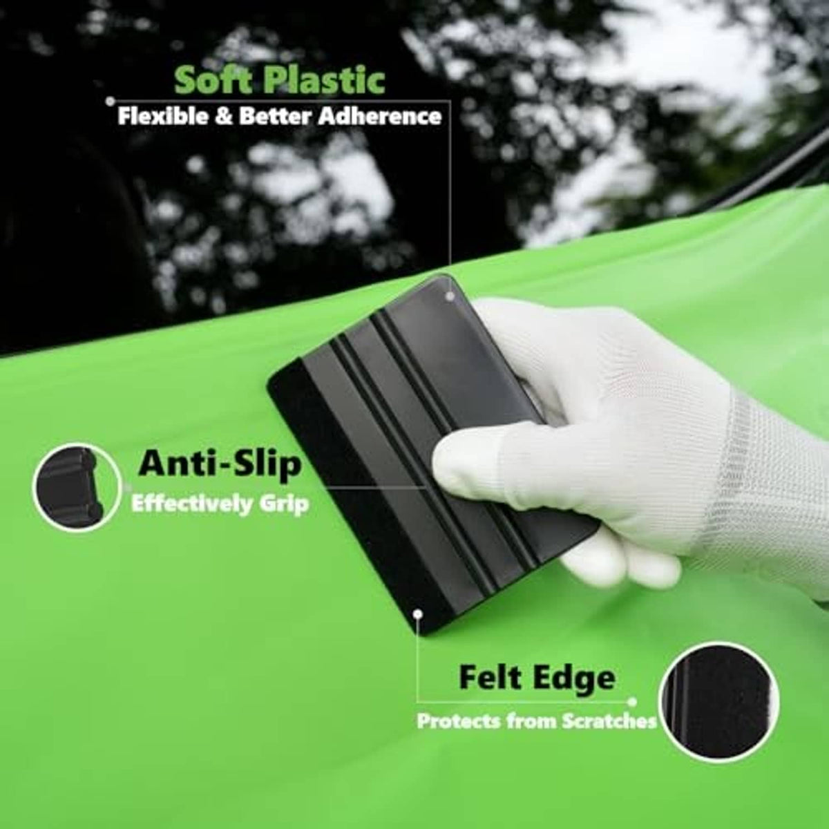 Black felt-edge squeegee tool with anti-slip grip, held by gloved hand