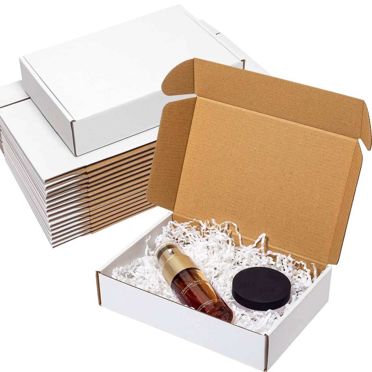 White corrugated shipping box set, open with brown lid and packing items inside