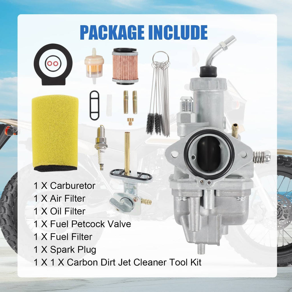 Carburetor assembly package showing carb, filters, fuel petcock, spark plug, and tools