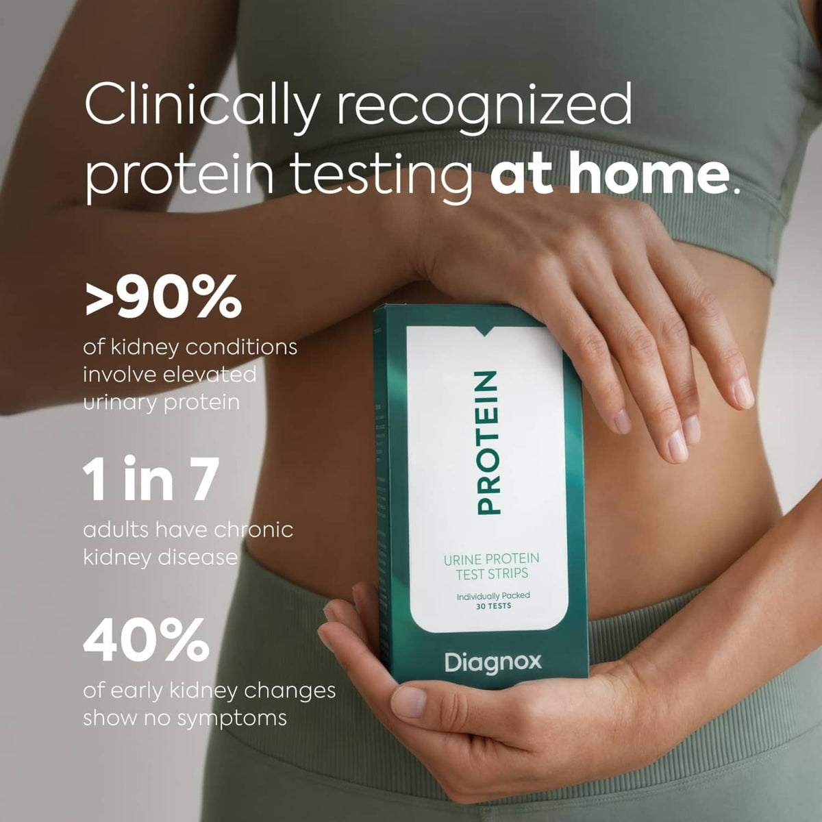Urine protein test strips home kit held in hands