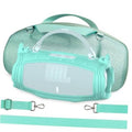Teal silicone speaker cover with clear handle and straps