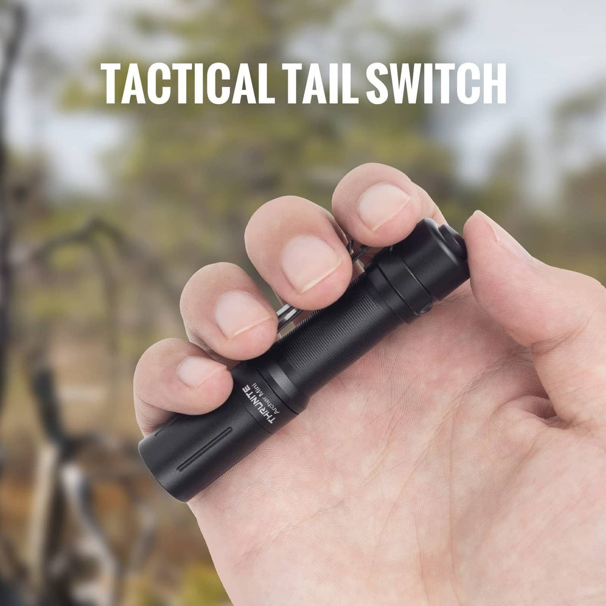 ThruNite Archer Mini pocket EDC pen flashlight, black, held in a hand