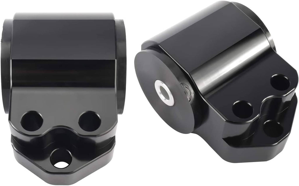 Pair of black engine mount brackets with circular bushing plates and bolt holes