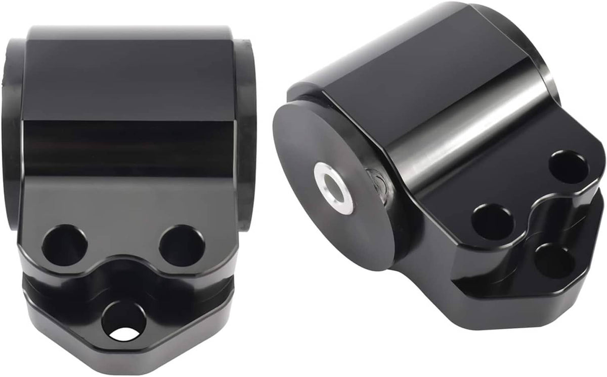 Pair of black engine mount brackets with circular bushing plates and bolt holes