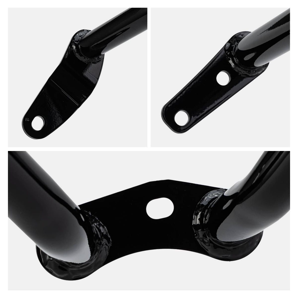 Close-up of black engine guard crash bar mounting brackets with holes