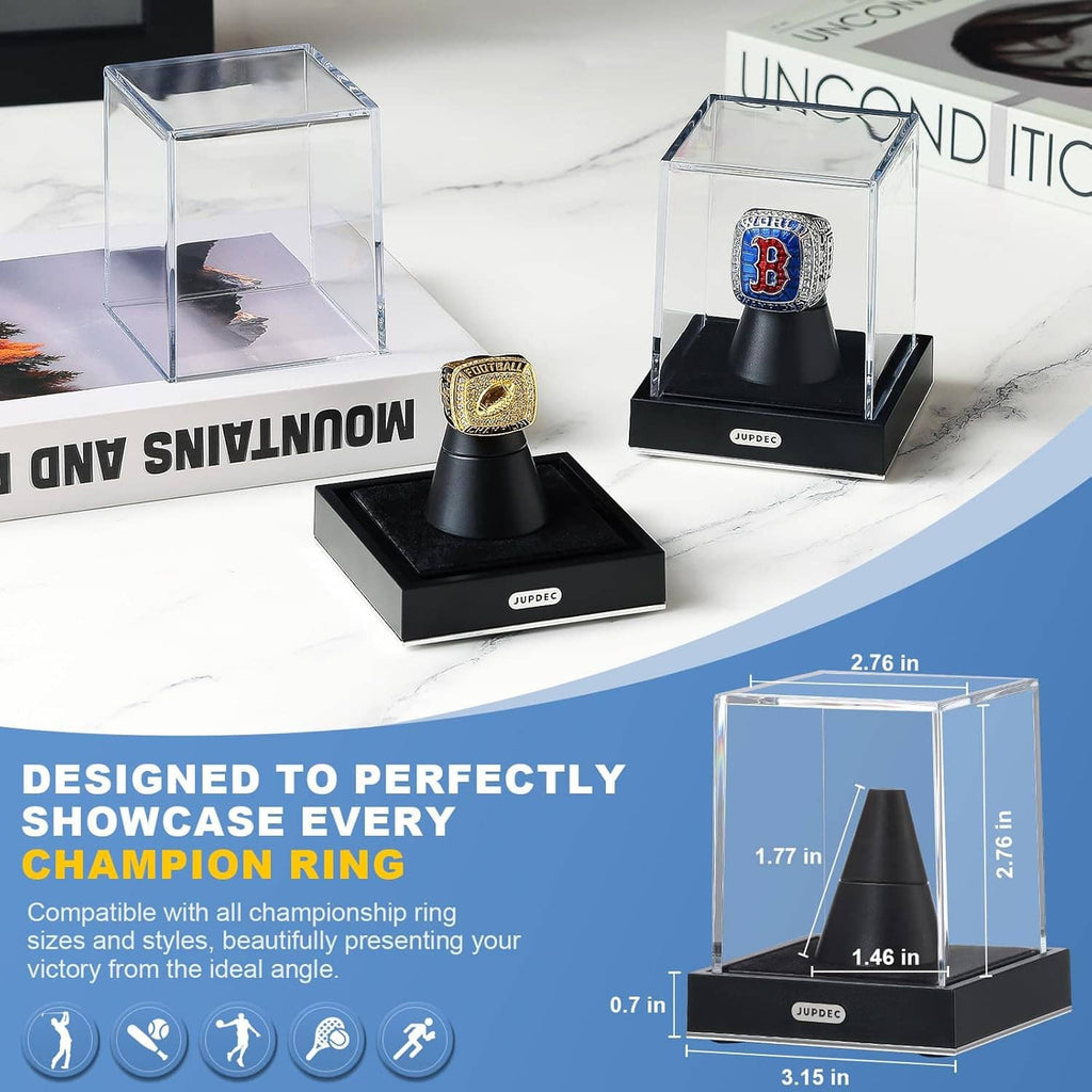 Clear acrylic ring display case with black base and cone holder, showing a team emblem ring