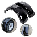 Black curved trailer fenders with ribbed step pads for wheel protection