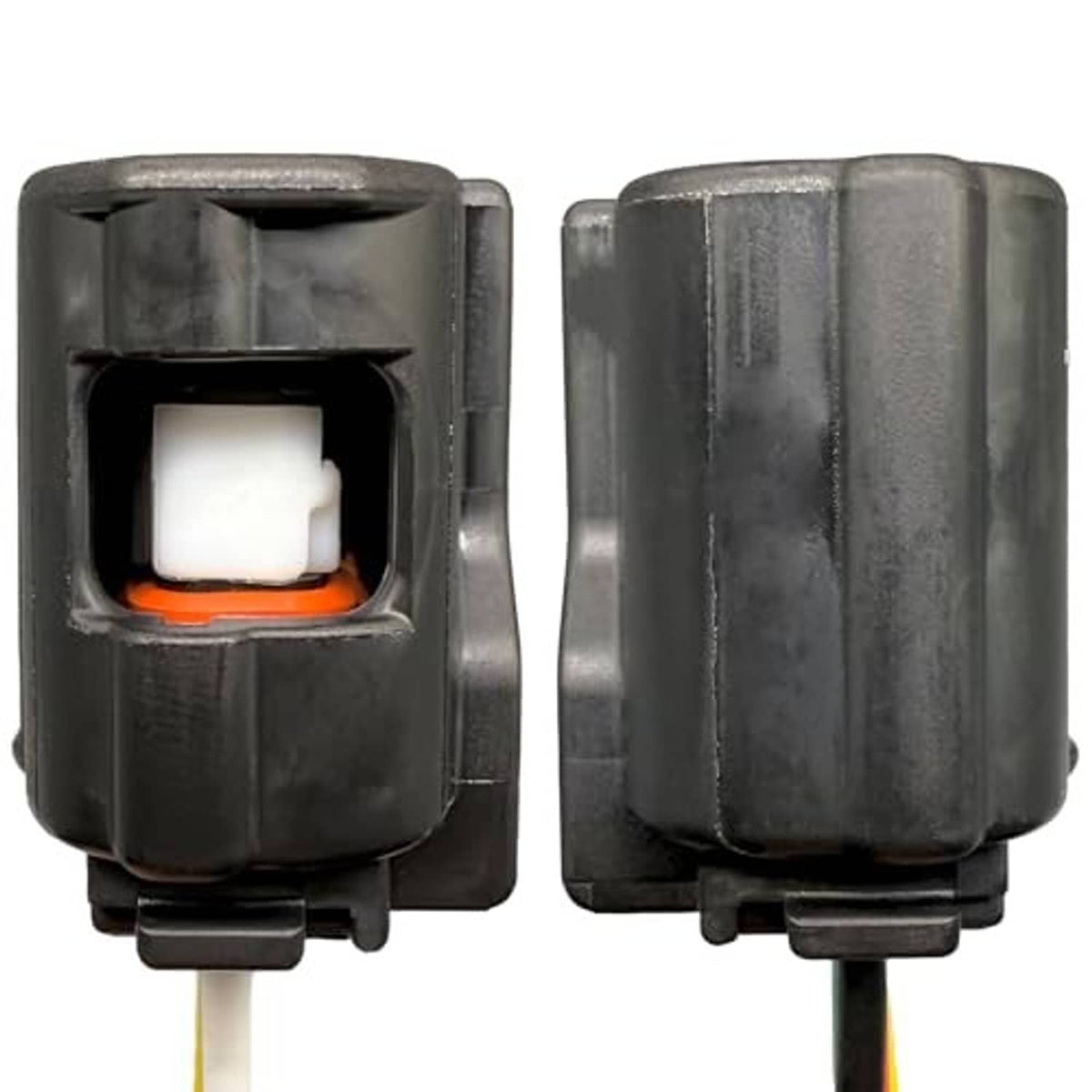 Two-part black electrical connector housing with wire leads visible from the openings