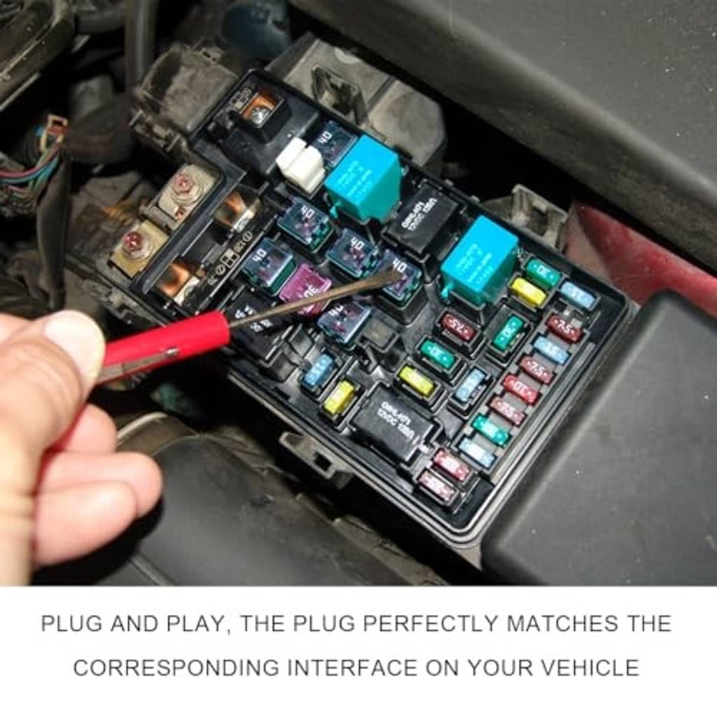 Relay and fuse panel in a car engine bay with blue relay module