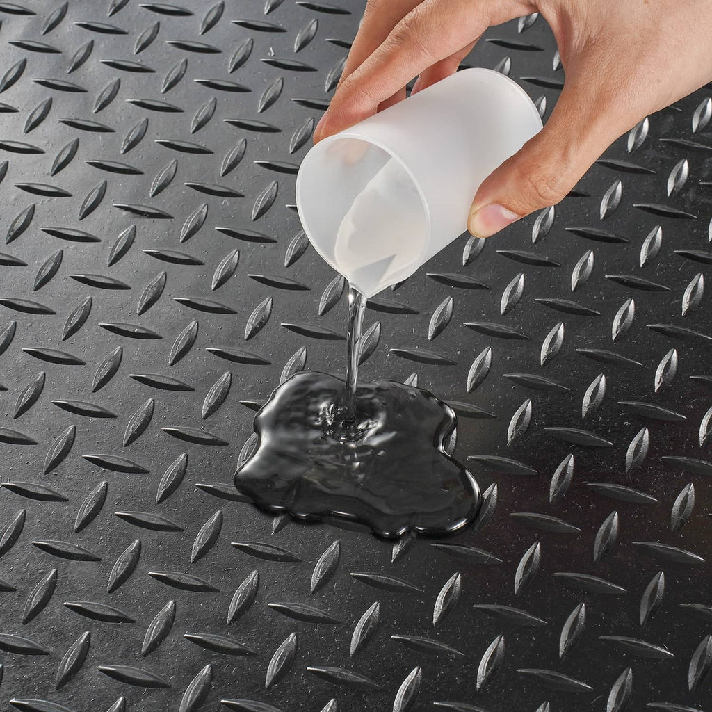 Garage floor mat, dark diamond-plate PVC vinyl surface with non-slip texture