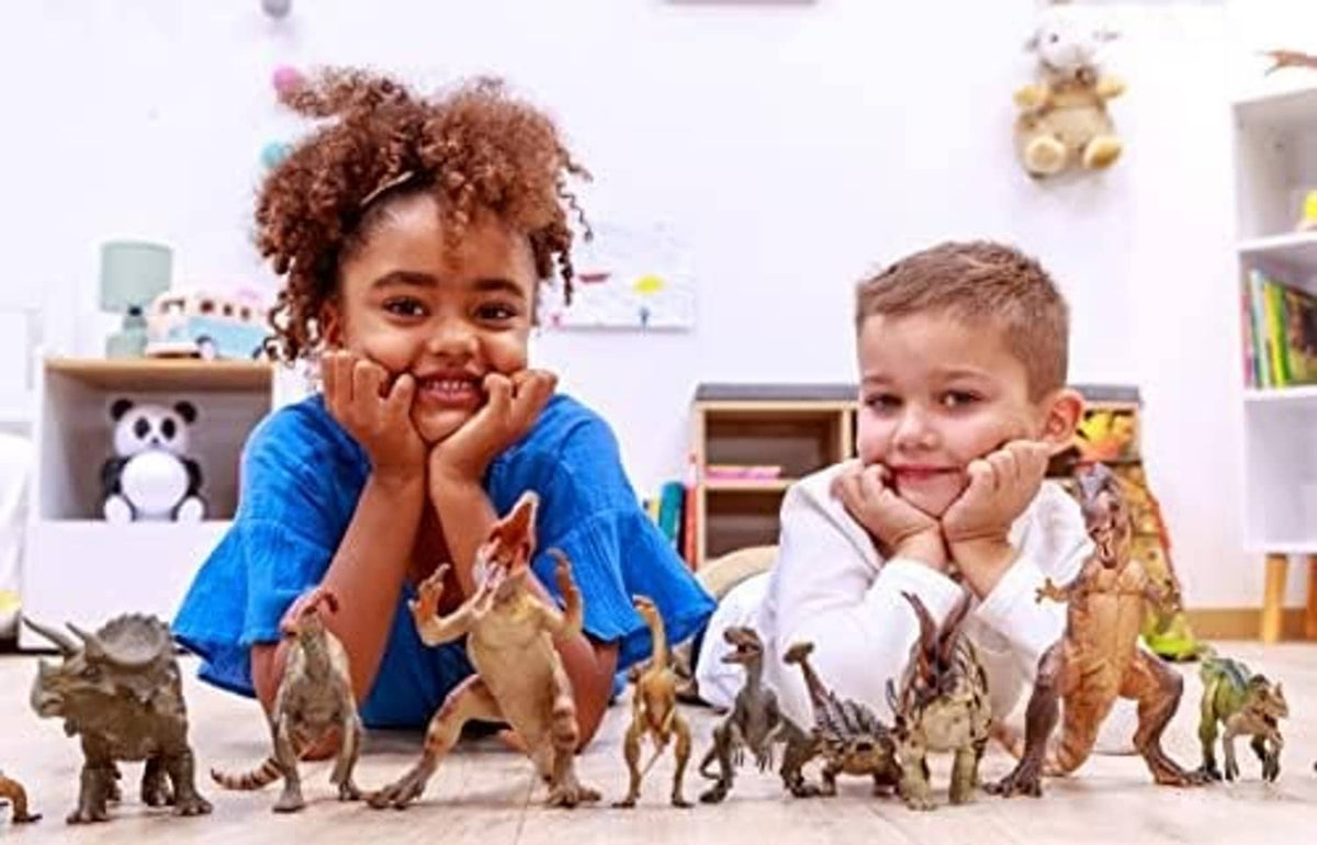 Children playing with painted dinosaur figurines, including a Compsognathus.