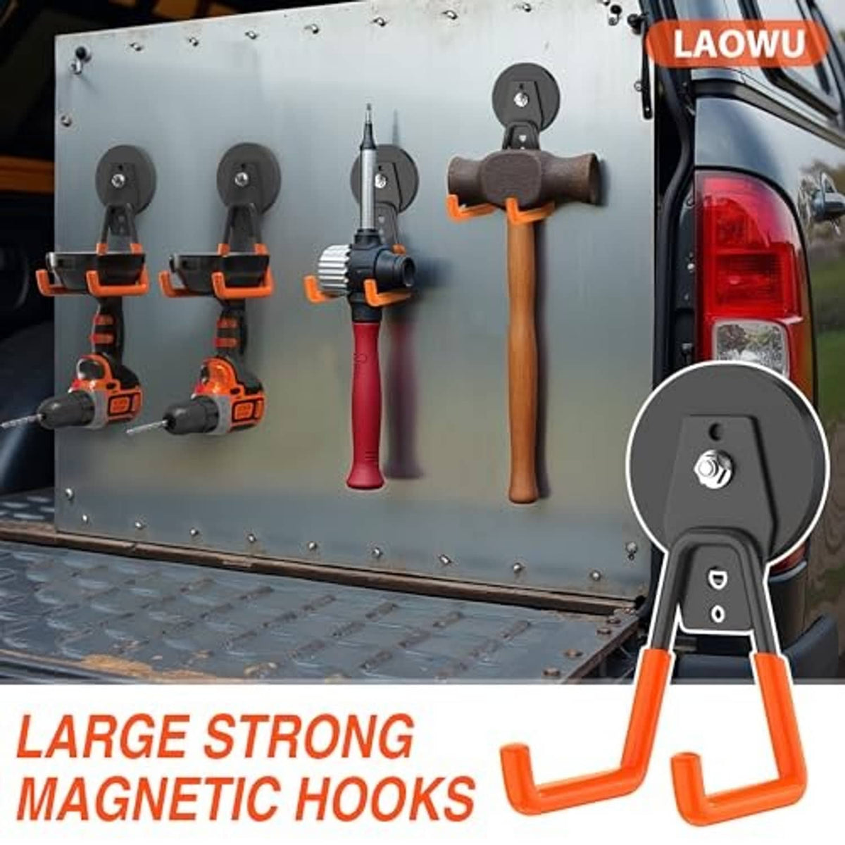 Large magnetic hooks in black and orange mounted on a metal tool panel