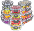 Stacked gray-lidded borosilicate glass food storage containers, assorted contents