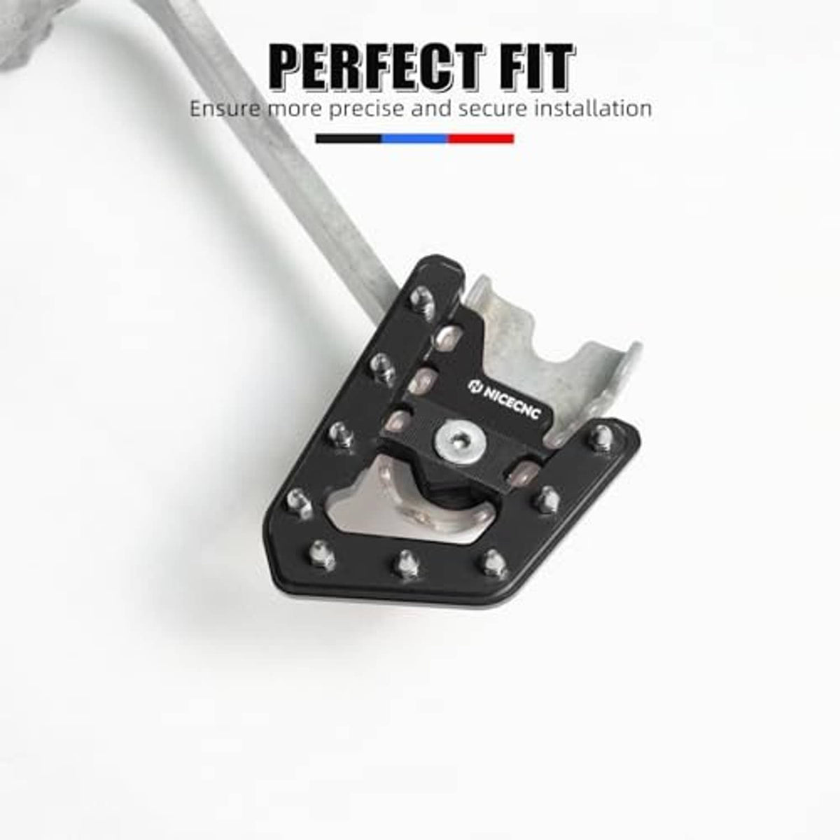 Black brake pedal lever extender with bolts on an open, stepped platform.
