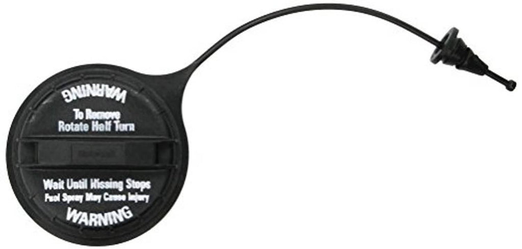 Fuel cap with tether line, black circular cover, warning text panel visible