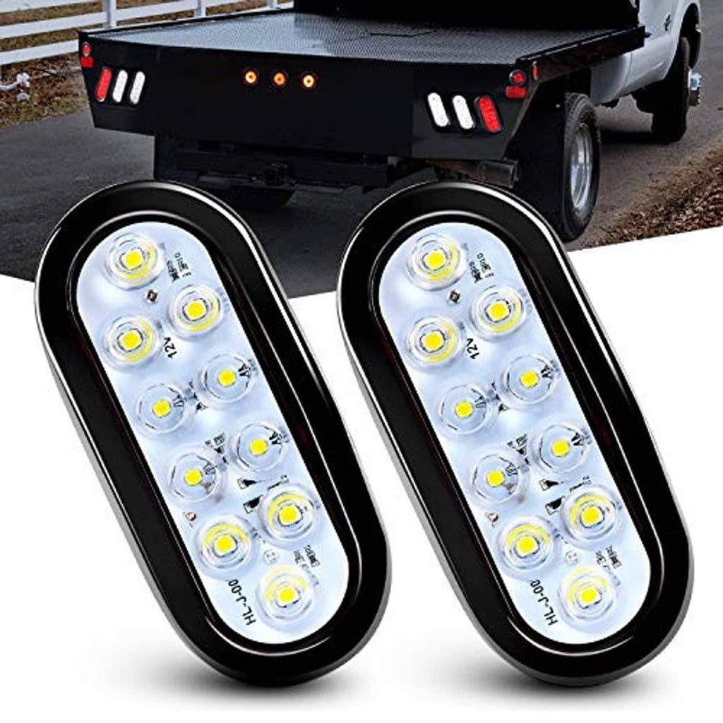 Two oval LED trailer tail lights with clear lenses in black housings