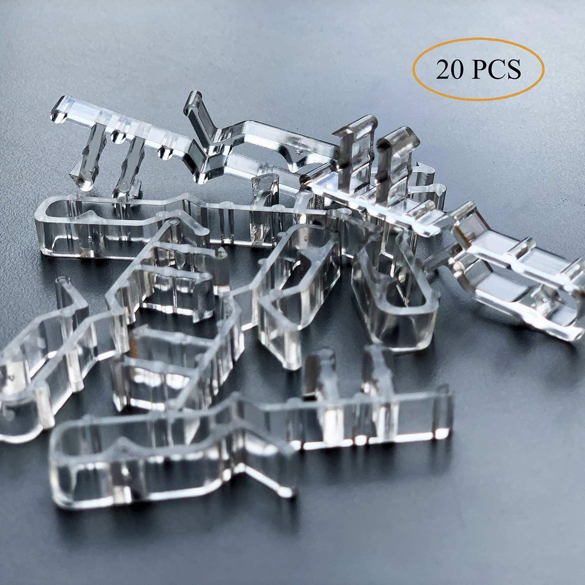 Chrome valance clips for blinds, 20 pcs shown in a bundled pile