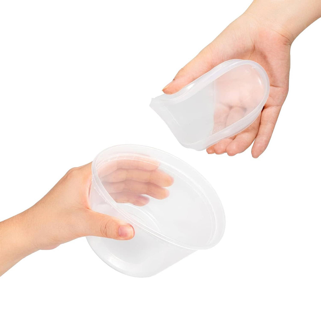 Clear plastic container with snap-on lid held in hands for deli storage