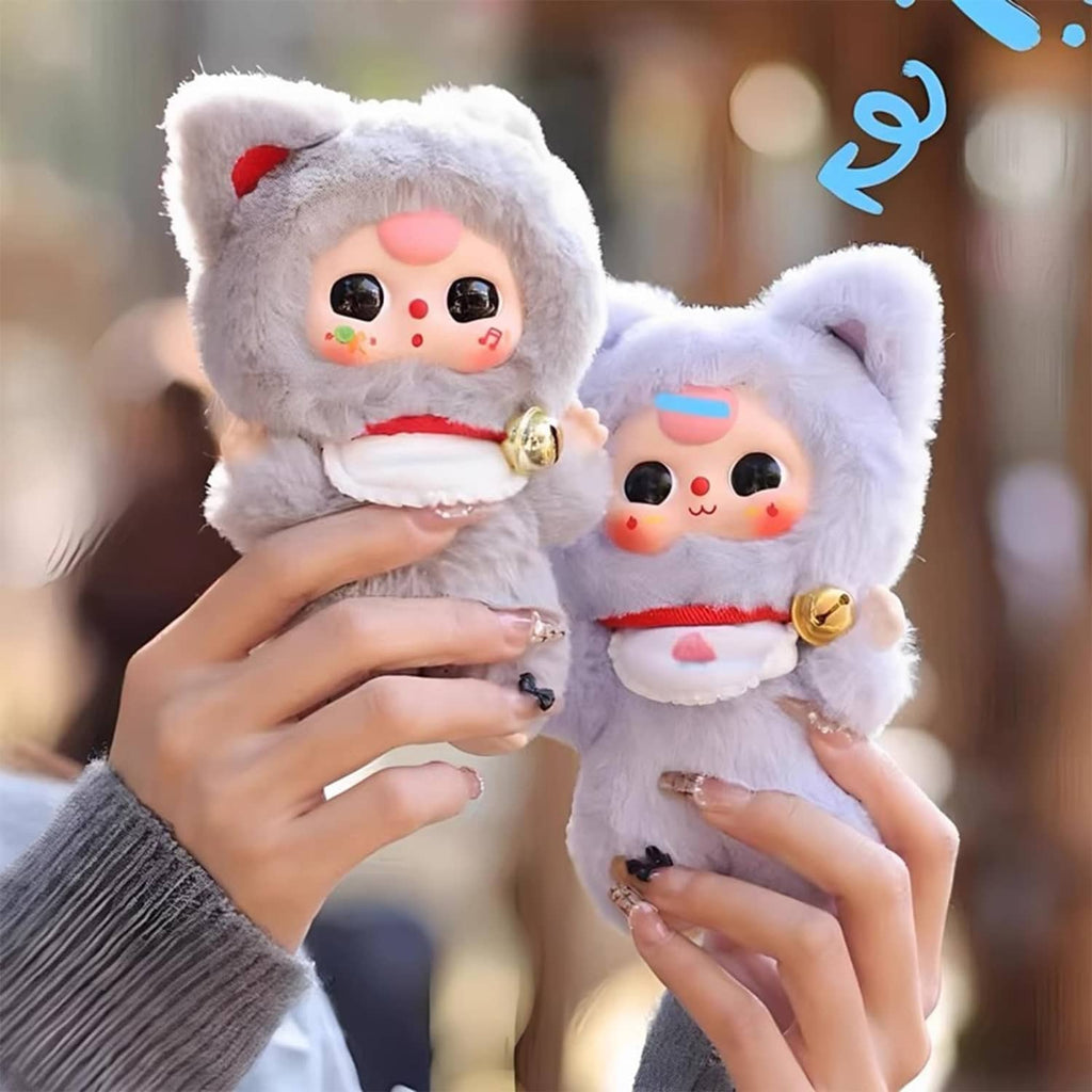 Pair of small plush cat dolls in light gray, each with a bell and red strap.