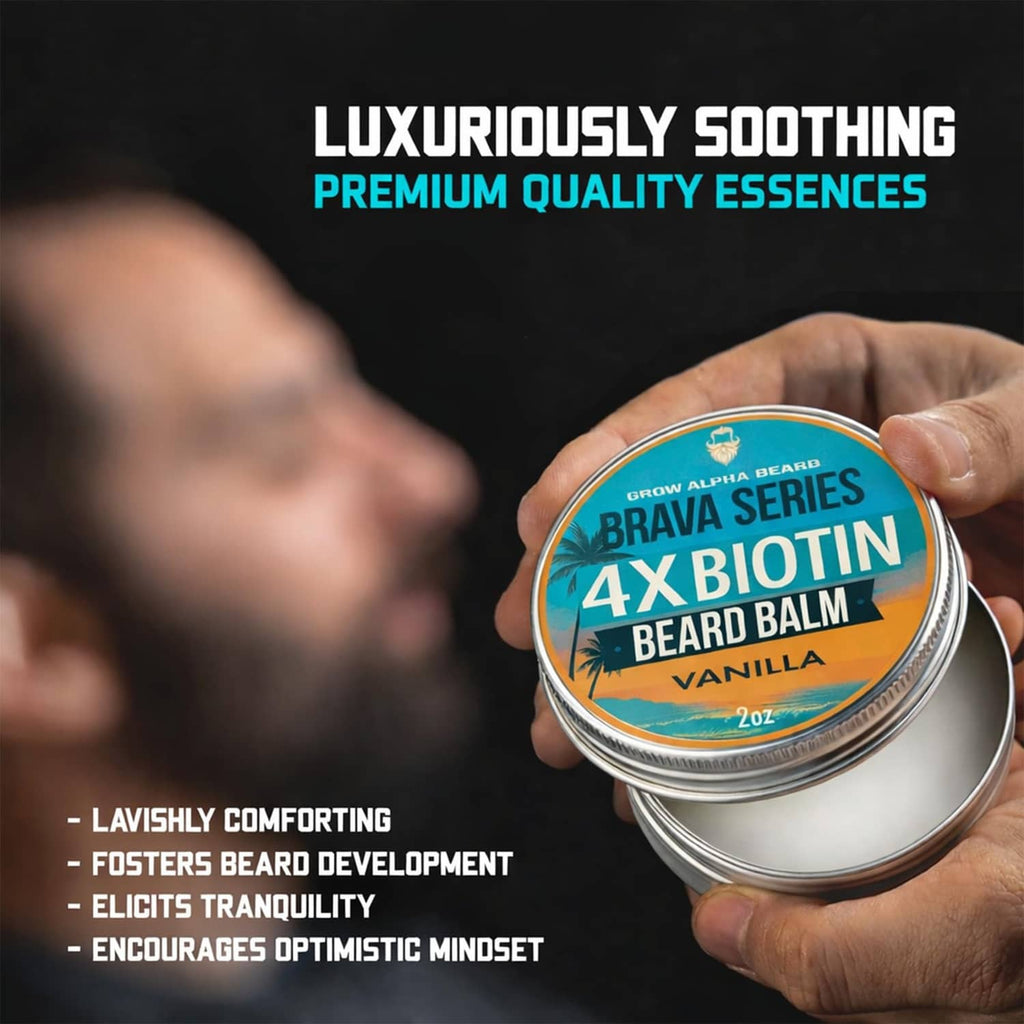 Hand holding 4x biotin beard balm tin, vanilla, premium soothing, 2 oz silver lid