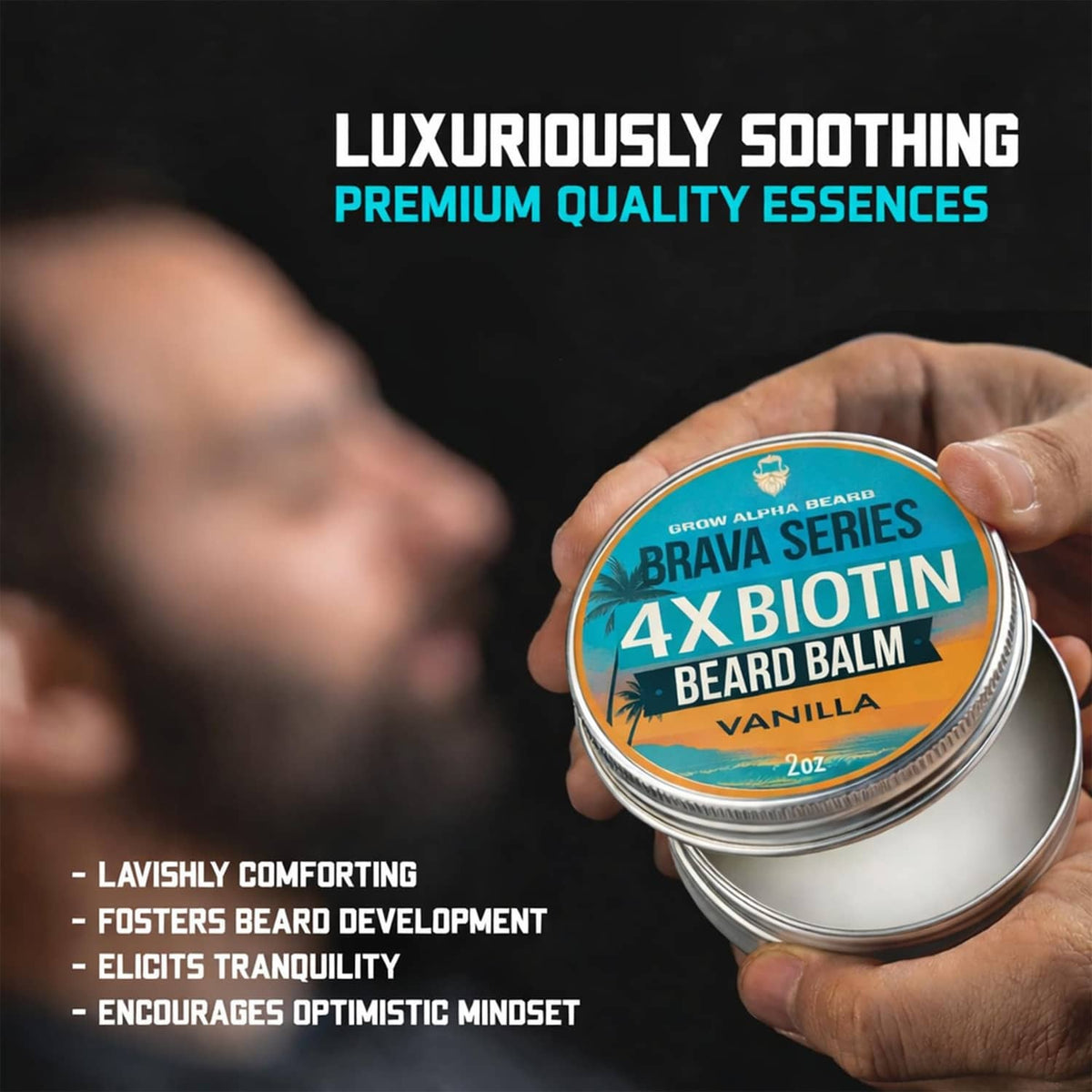 Hand holding 4x biotin beard balm tin, vanilla, premium soothing, 2 oz silver lid