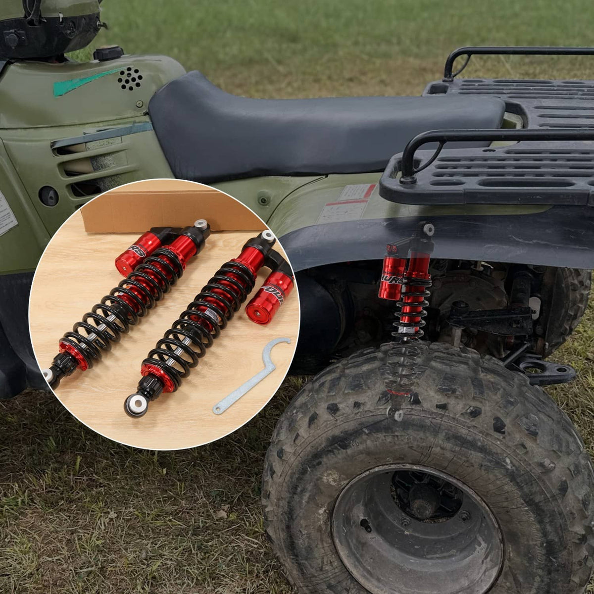 Rear air shocks installed on ATV: red bodies, black springs, and side wrench for adjustment