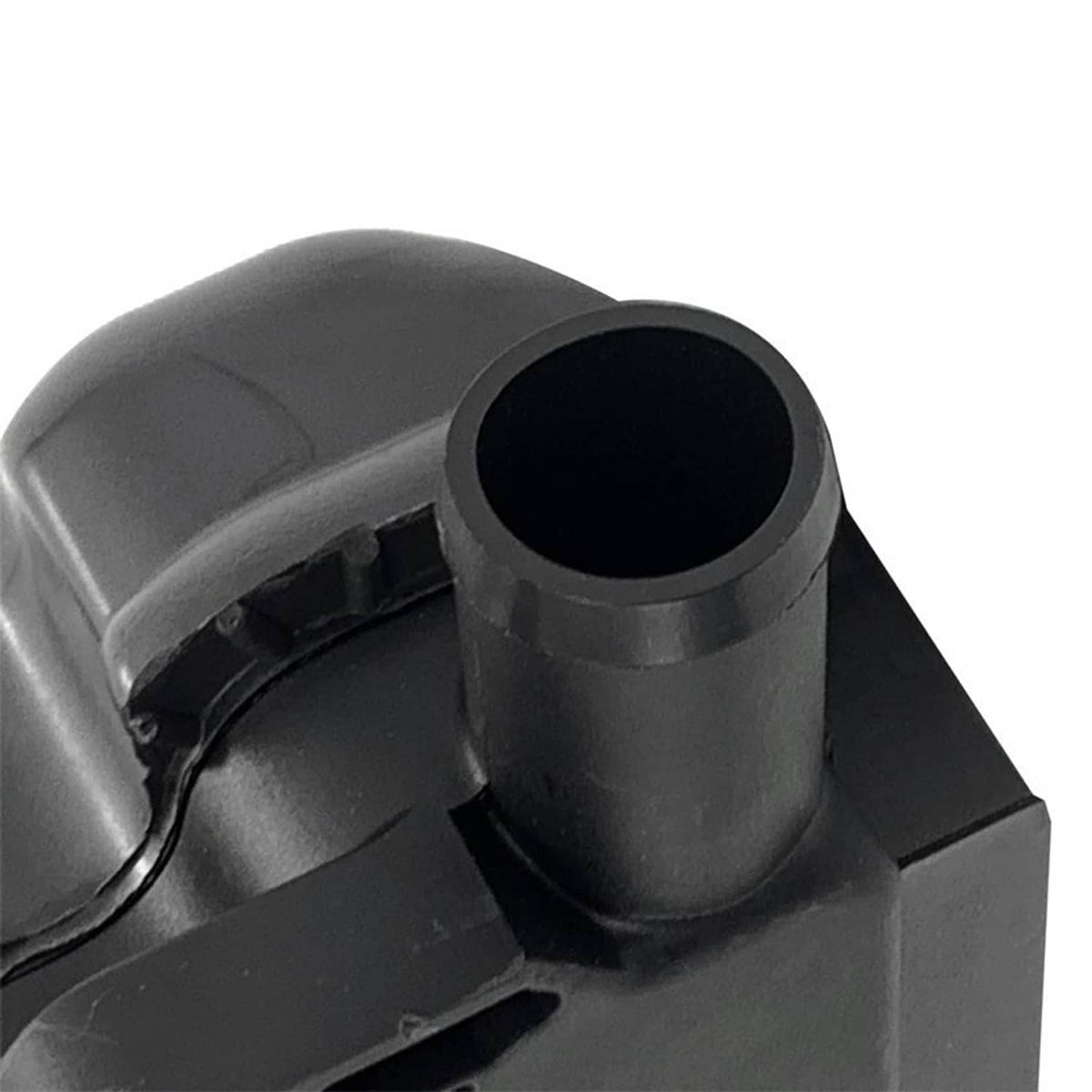 Close-up of black crankcase breather housing with large circular opening