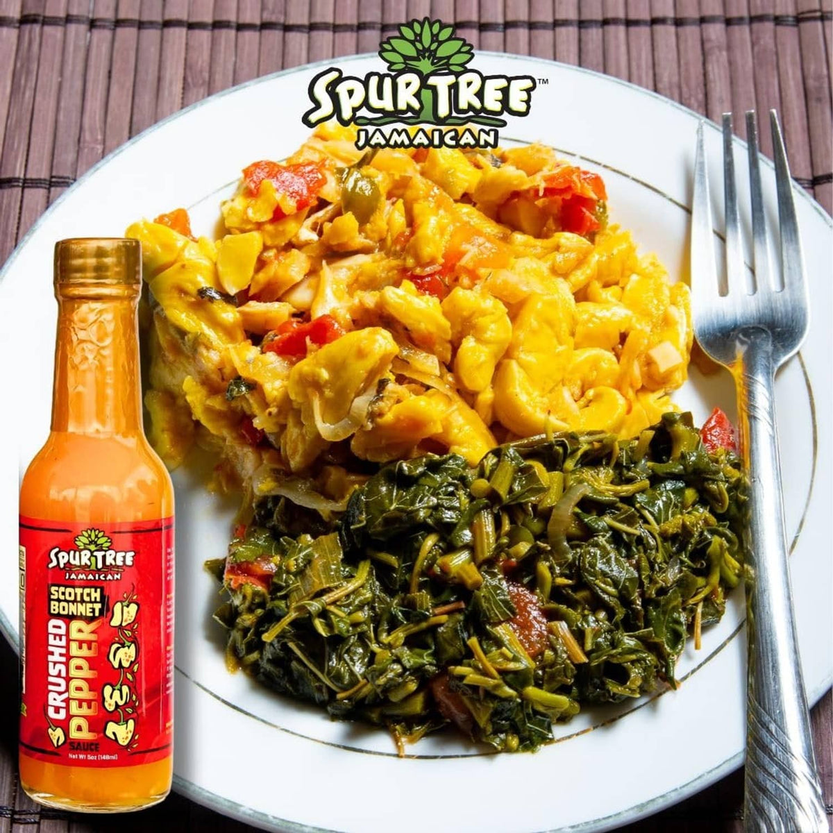 Spur Tree Jamaican scotch bonnet pepper sauce bottle beside plate of saucy greens