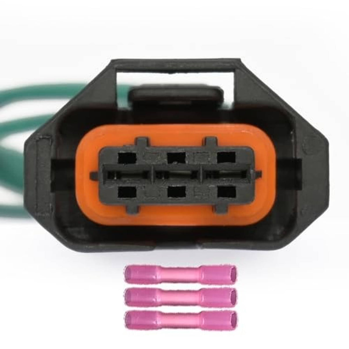 Orange 3-pin camshaft sensor connector close-up with black terminal block and purple pins