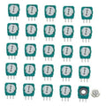 Set of teal rotary potentiometers with white centers and three-pin leads