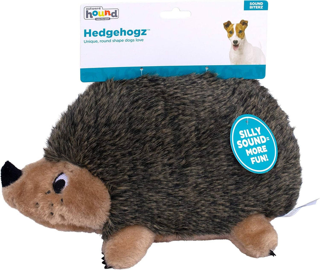 Packaged plush hedgehog dog toy with round spiky texture and tan face
