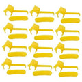 Yellow plastic tire changer inserts with curved wheel-protector arms, 12-pack layout