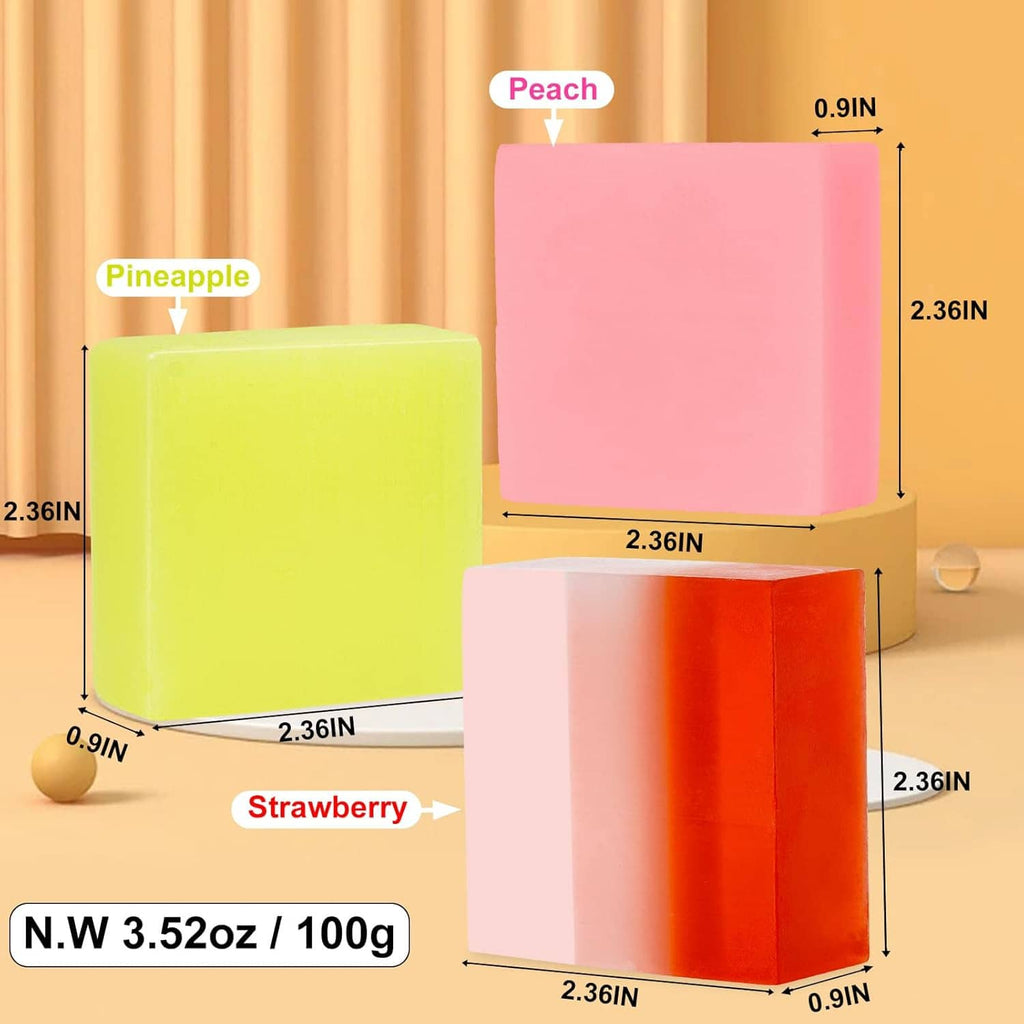Three handmade soap bars in yellow, pink, and orange on a warm background