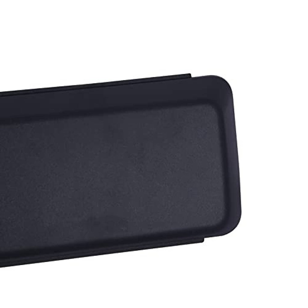 Close-up of dark gray-black rectangular plastic grille cover insert