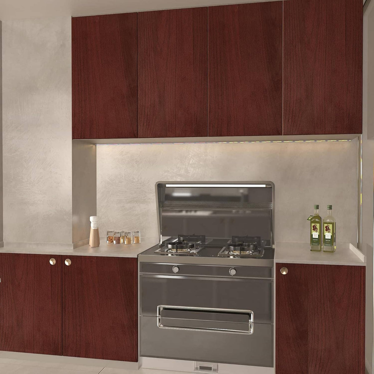 Cherry wood contact paper on kitchen cabinetry panels and backsplash, dark red-brown