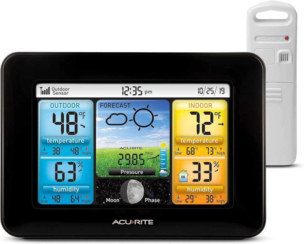 Wireless home weather station with color display and wireless sensor module alongside