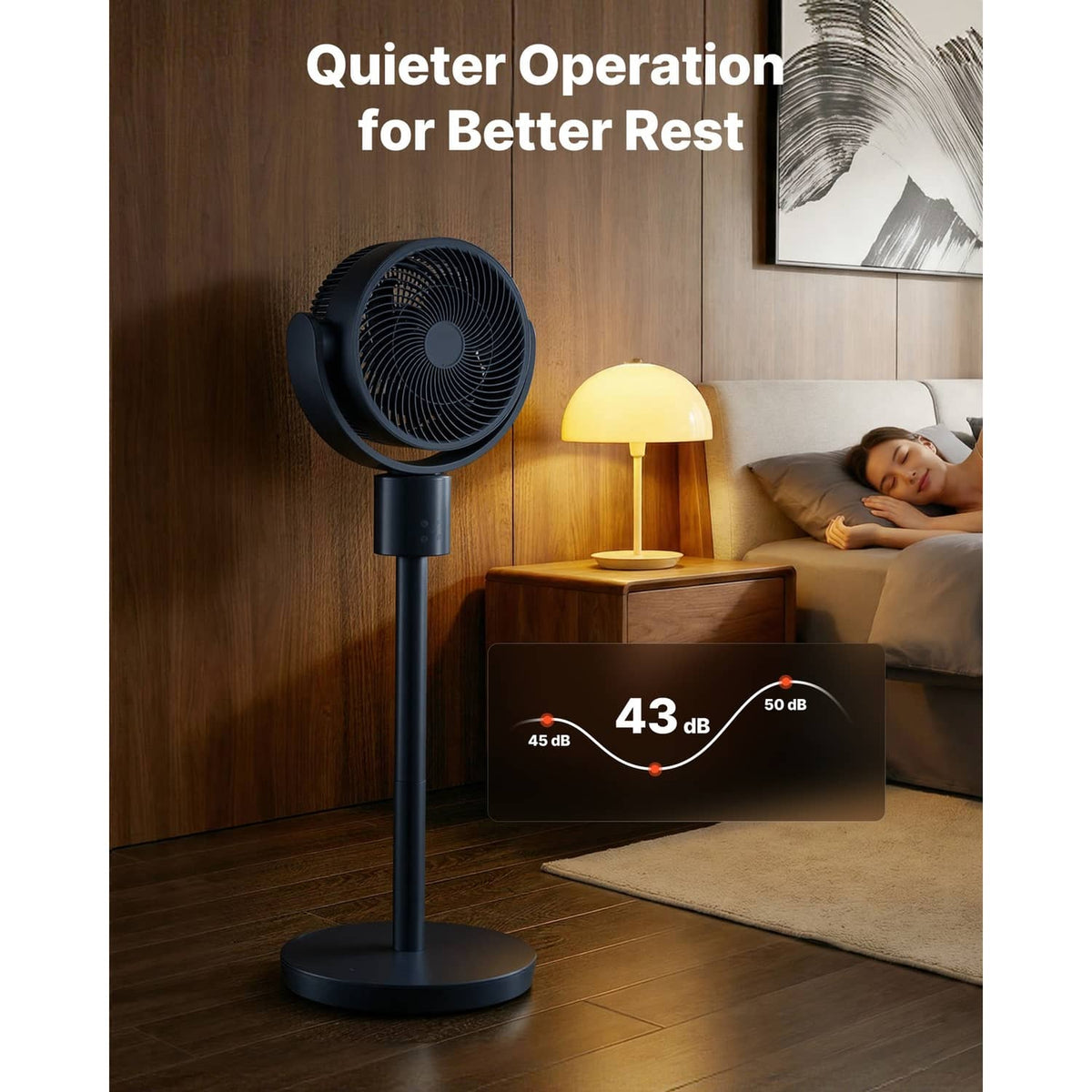 Dark blue-gray pedestal fan on a round stand base, shown standing upright