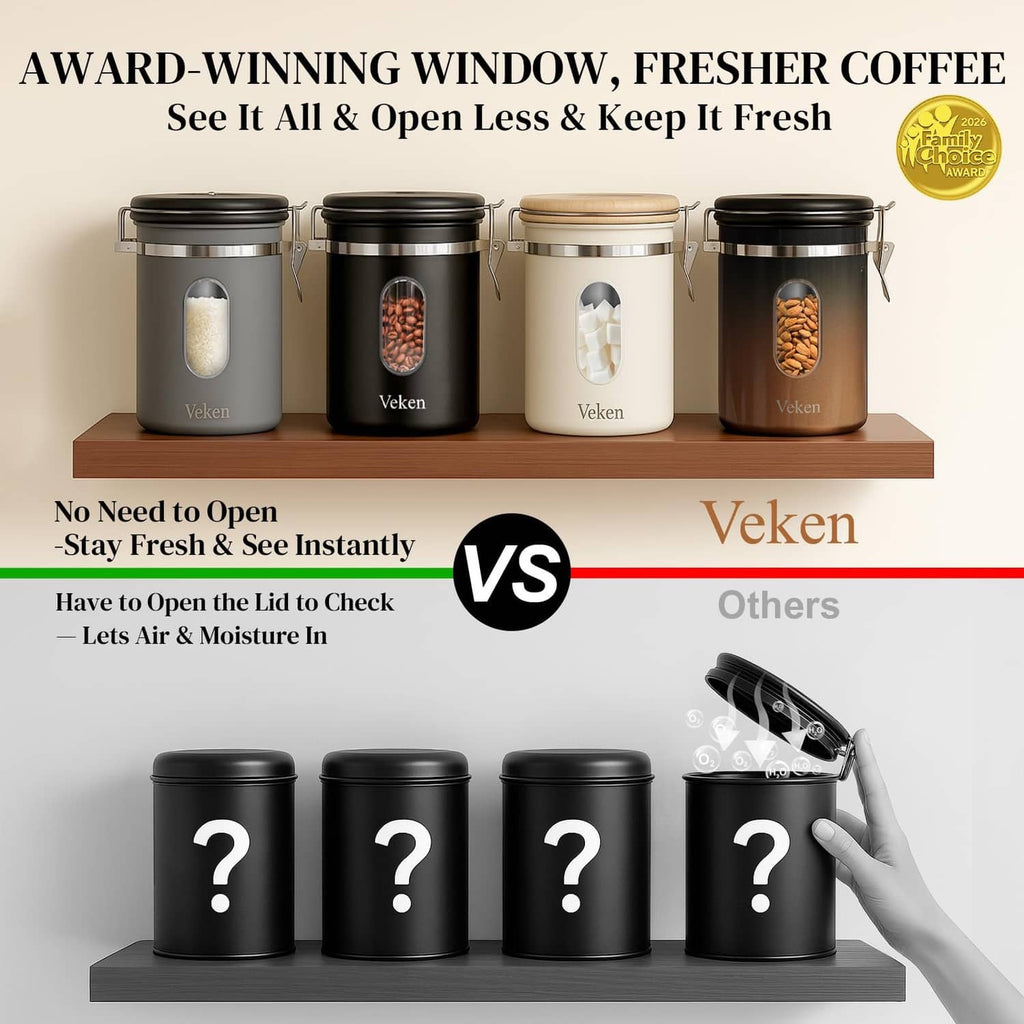 Cream stainless coffee canister with clear window and hinged lid, shown on display