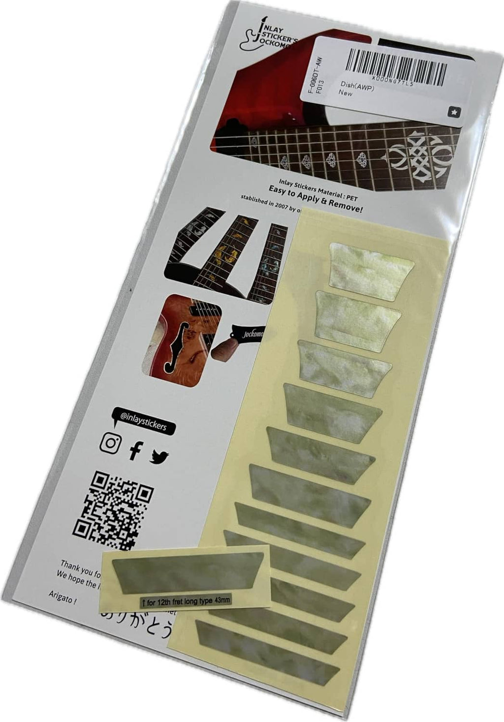 Back of inlay sticker sheet packaging with barcode and pale rectangular markers