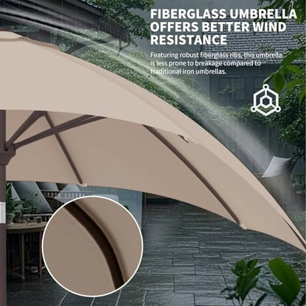 Beige umbrella canopy with fabric edge trim and metal rib spokes at the hub